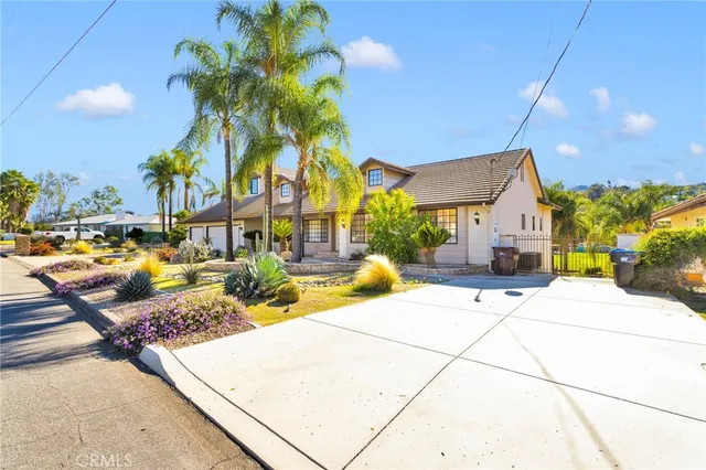 a view of multiple houses with a swimming pool