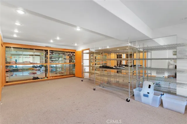 a room with lots of table chair