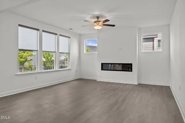 a kitchen with a sink a counter top space cabinets and stainless steel appliances