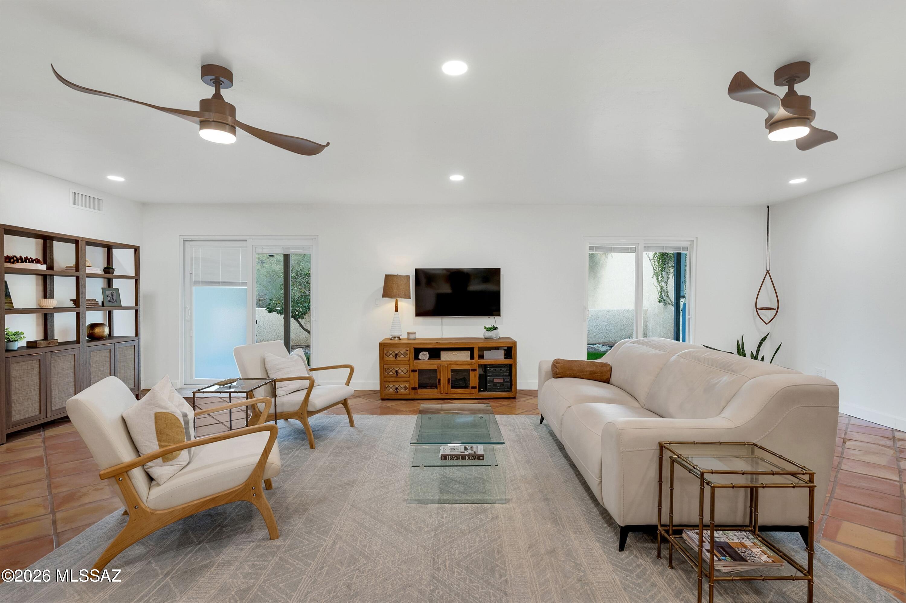 6941 East Rivercrest Road Tucson, AZ 85750 - Photo 5 of 32 a living room with furniture