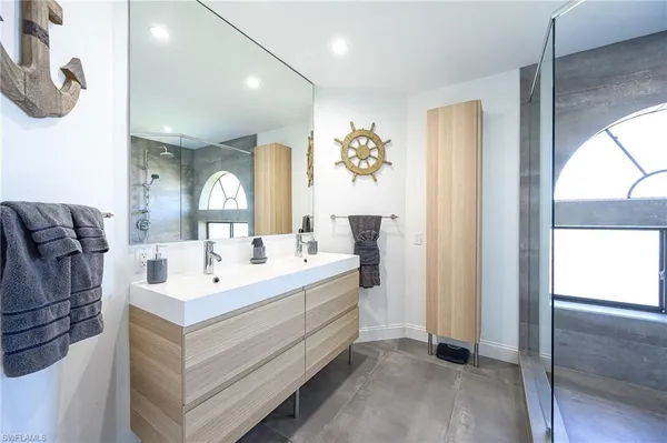 a view of bathroom with dual sinks