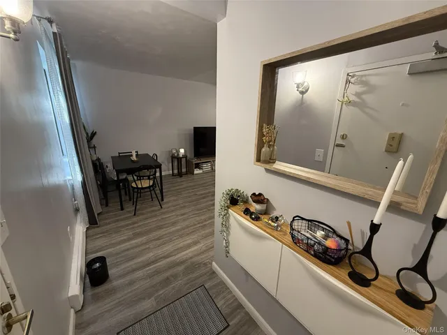 a view of a workspace with furniture and staircase