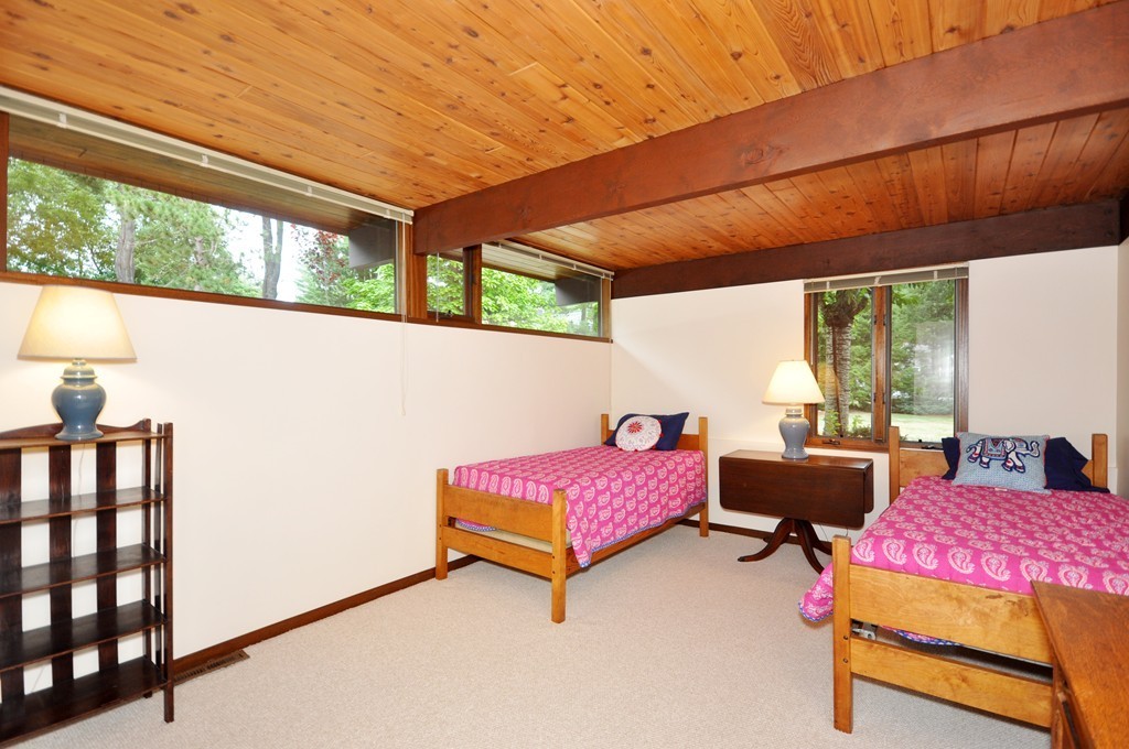 90 Indian Spring Road Concord, MA 01742 - Photo 10 of 13 a bedroom with furniture and a large window