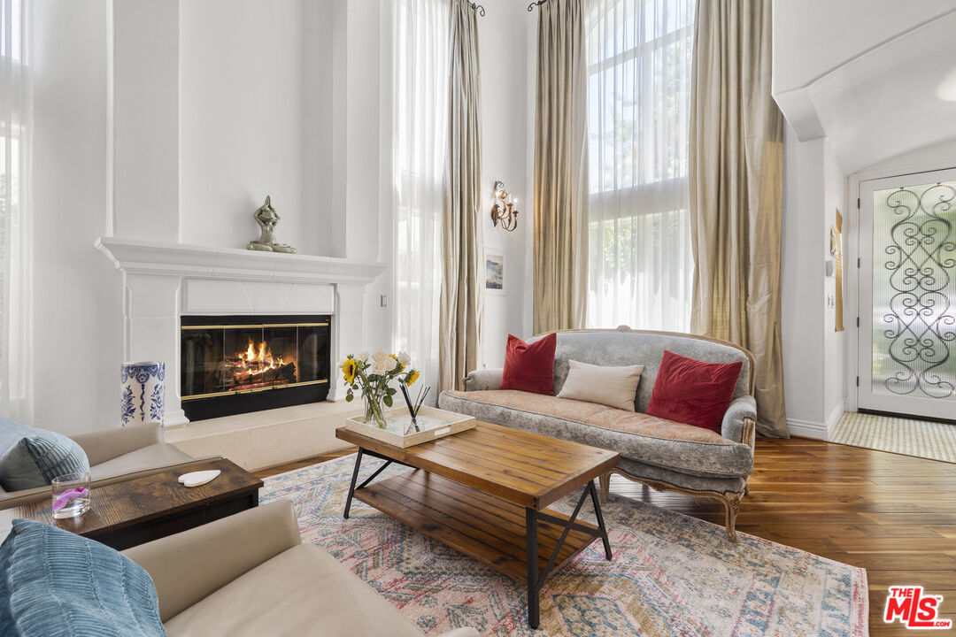 4544 Tobias Avenue Sherman Oaks, CA 91403 - Photo 13 of 55 a living room with furniture and a fireplace