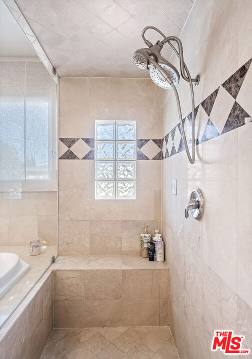 4544 Tobias Avenue Sherman Oaks, CA 91403 - Photo 21 of 55 a bathroom with a bathtub and shower