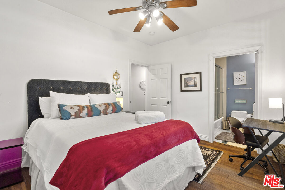 4544 Tobias Avenue Sherman Oaks, CA 91403 - Photo 38 of 55 a bed room with a bed and a chair