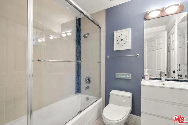 a view of front door with wooden floor