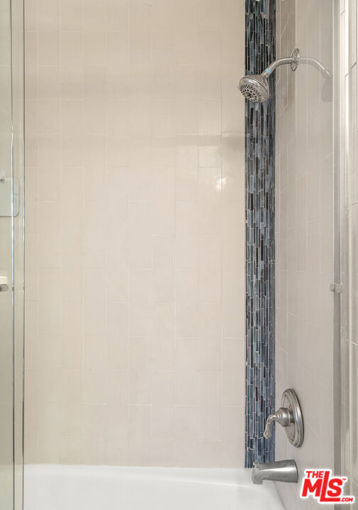 4544 Tobias Avenue Sherman Oaks, CA 91403 - Photo 40 of 55 a bathroom with a shower and a sink