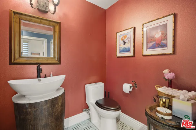 a bedroom with bed and window