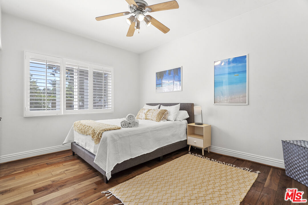 4544 Tobias Avenue Sherman Oaks, CA 91403 - Photo 50 of 55 a bedroom with a bed and a window