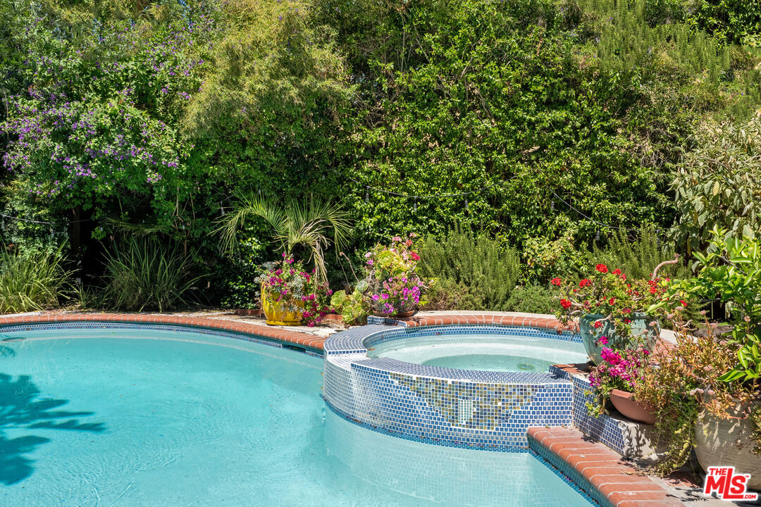 4544 Tobias Avenue Sherman Oaks, CA 91403 - Photo 5 of 55 a view of a fountain in the backyard of a house
