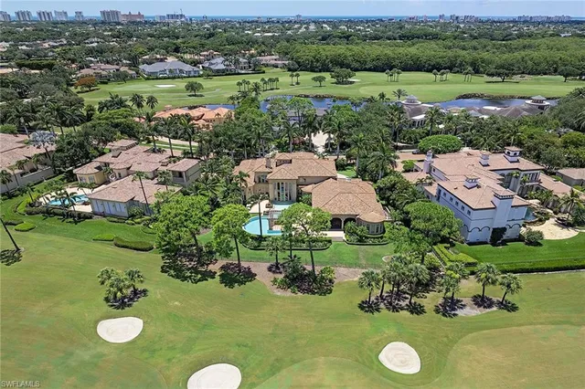 an aerial view of a house with outdoor space
