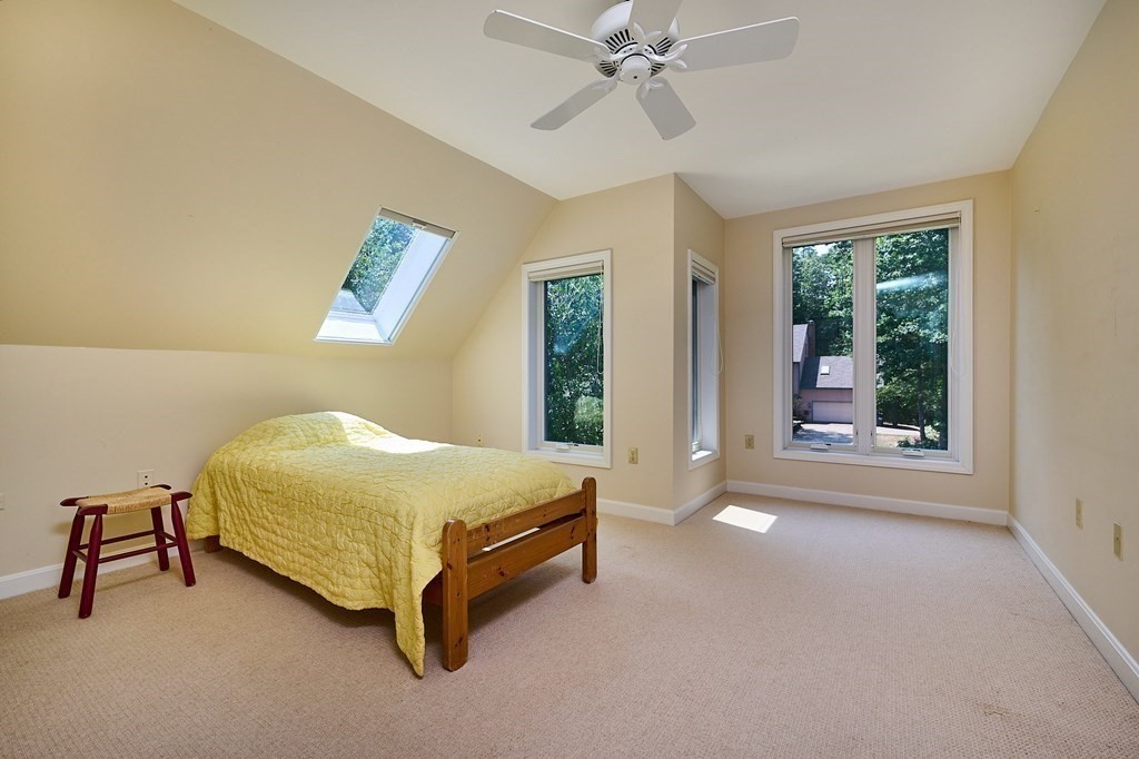 60 Country Corners Road Amherst, MA 01002 - Photo 23 of 42 a bedroom with a bed and a window