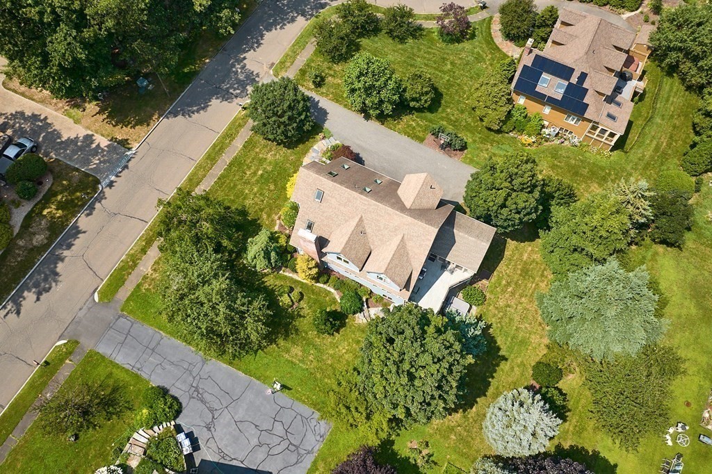 60 Country Corners Road Amherst, MA 01002 - Photo 36 of 42 an aerial view of a house with a yard and a garden