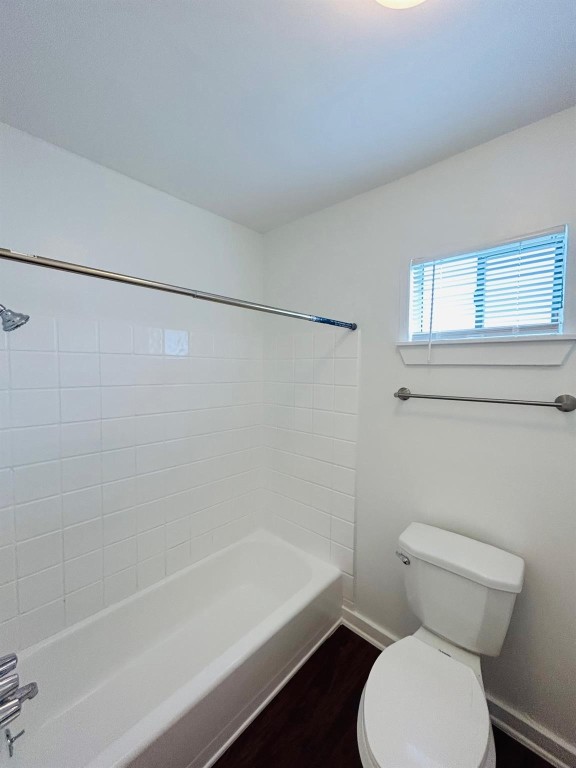 3629 North MacGregor Way, Unit 137 Houston, TX 77004 - Photo 15 of 15 a bathroom with a toilet and a bathtub