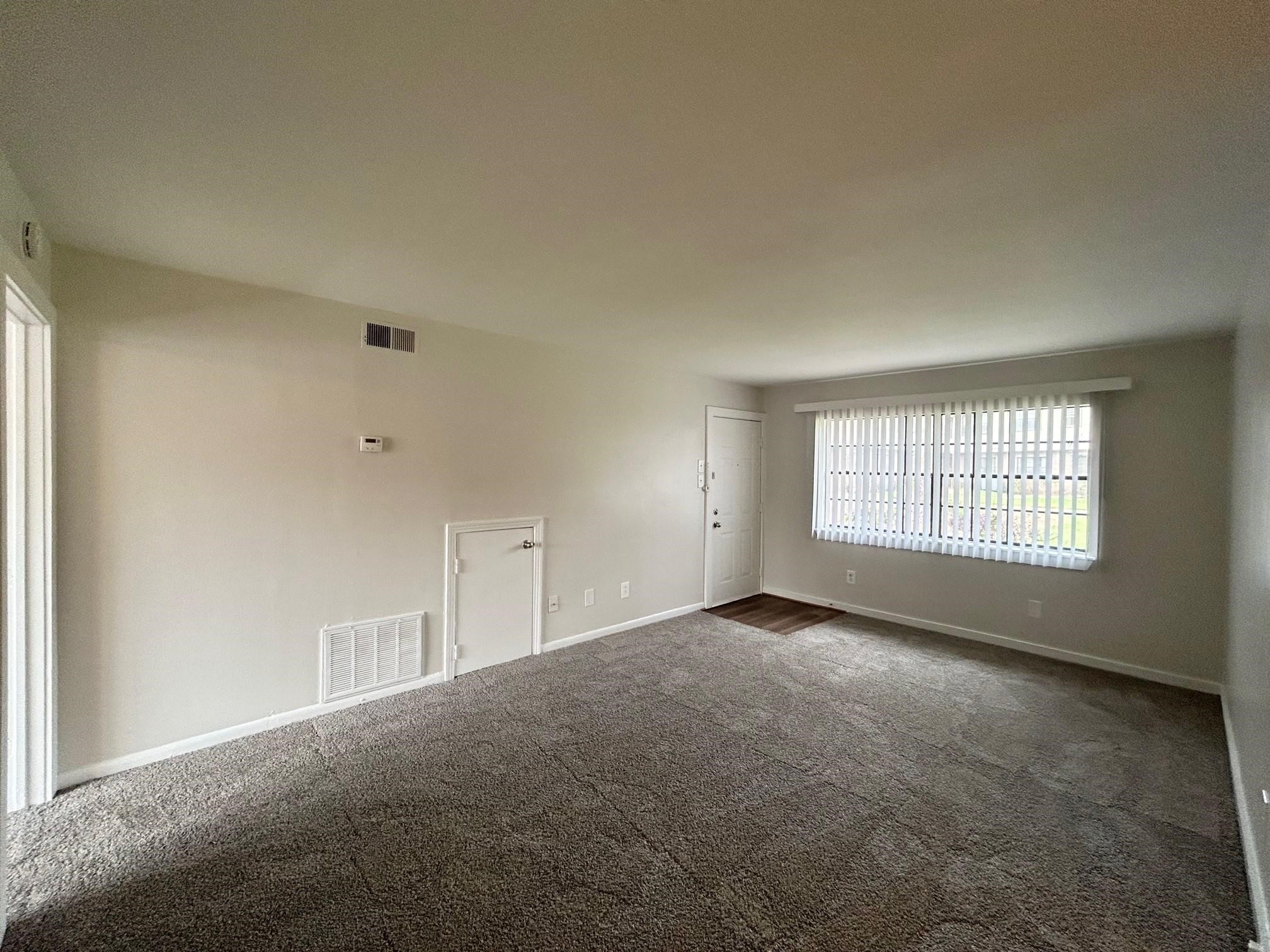 3629 North MacGregor Way, Unit 137 Houston, TX 77004 - Photo 4 of 15 a view of an empty room with a window