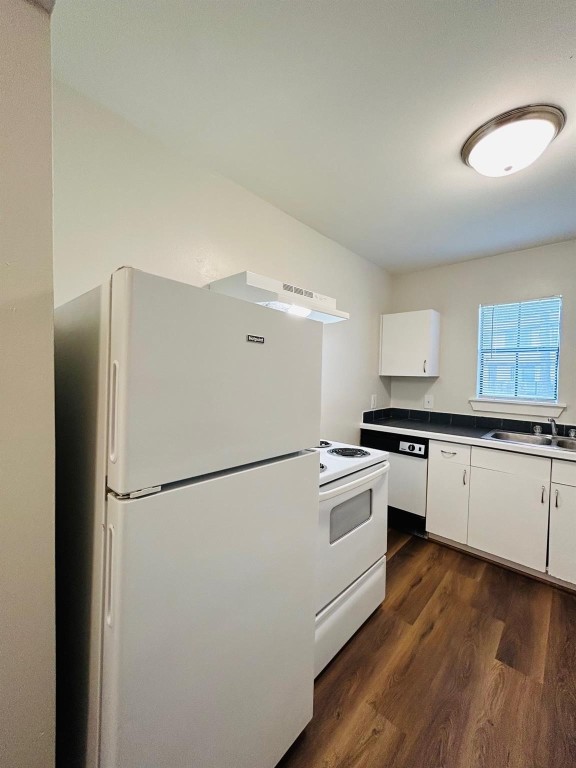 3629 North MacGregor Way, Unit 137 Houston, TX 77004 - Photo 9 of 15 a kitchen with stainless steel appliances a refrigerator a sink and white cabinets