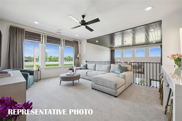 a bed sitting in a spacious bedroom next to a window