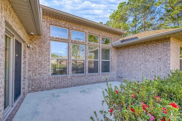 a view of a street with a building in the background