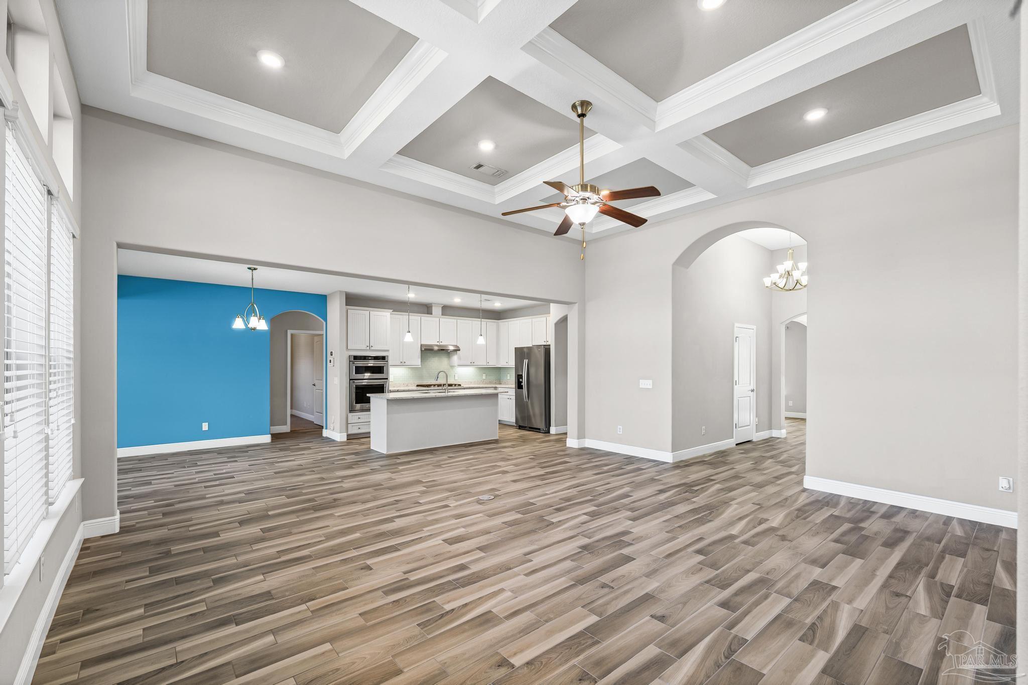 7166 Jasper Street Navarre, FL 32566 - Photo 6 of 71 a view of a livingroom with a ceiling fan