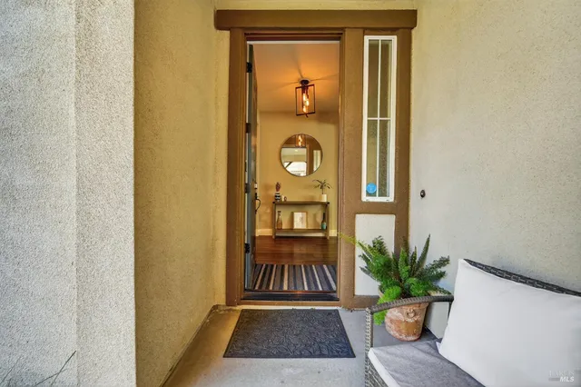 a view of entryway with wooden floor