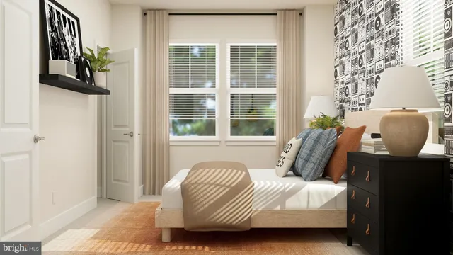 a bedroom with a bed and window