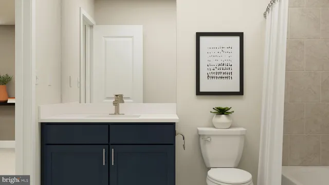 a spacious bedroom with a bed and a window