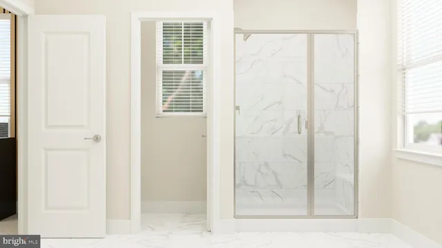 a bathroom with a toilet and a sink