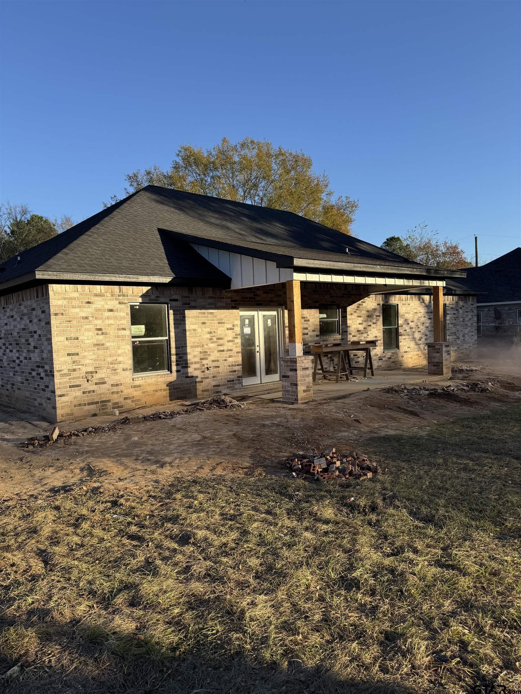 7235 County Road 485 Tyler, TX 75706 - Photo 4 of 4 a front view of a house with garden