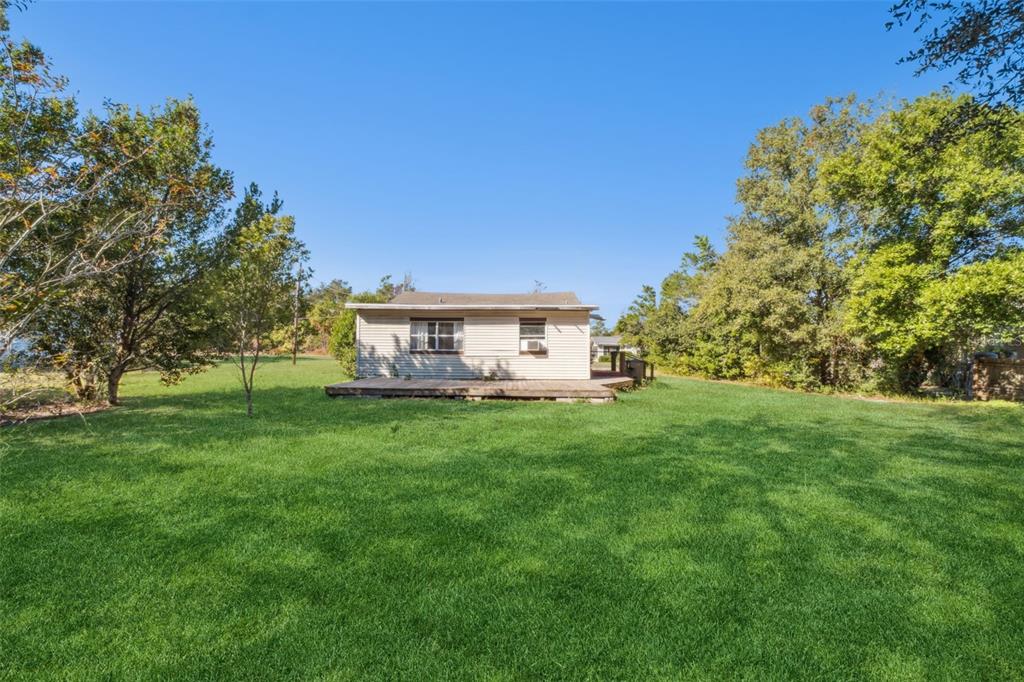 40542 West 3rd Avenue Umatilla, FL 32784 - Photo 1 of 13 a view of a house with backyard