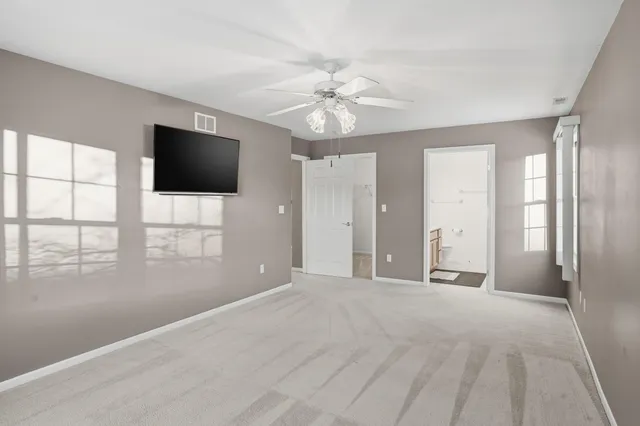 a view of a livingroom with a flat screen tv