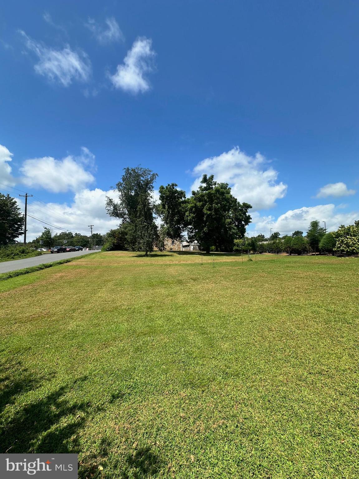 a view of an ocean and a yard