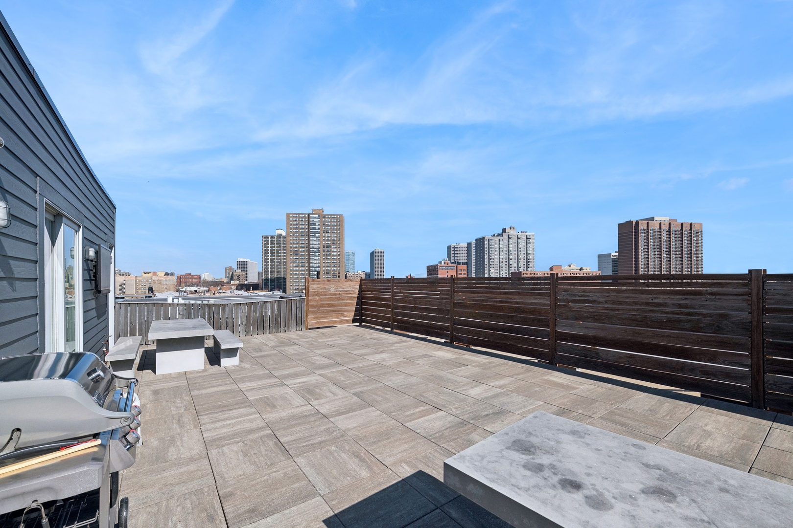 4027 North Broadway, Unit 501 Chicago, IL 60613 - Photo 10 of 14 a view of city with tall buildings