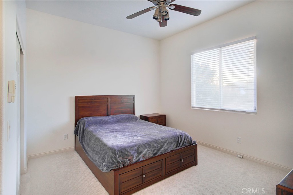 18120 Gentian Avenue Riverside, CA 92508 - Photo 34 of 51 a bedroom with a bed and window