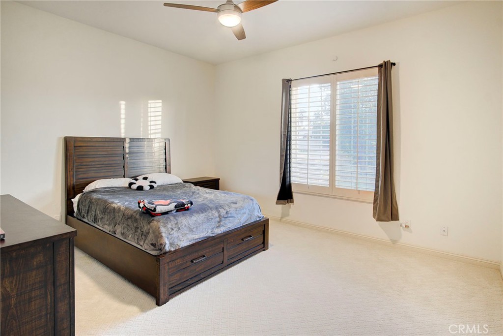 18120 Gentian Avenue Riverside, CA 92508 - Photo 37 of 51 a bedroom with a bed and window