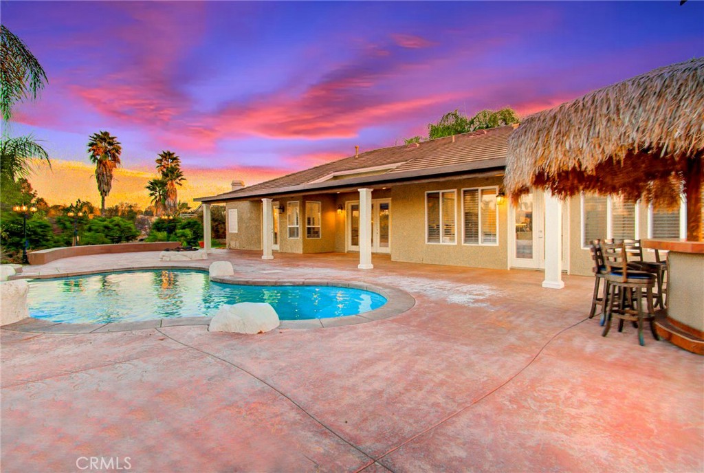 18120 Gentian Avenue Riverside, CA 92508 - Photo 44 of 51 a front view of a house with a yard