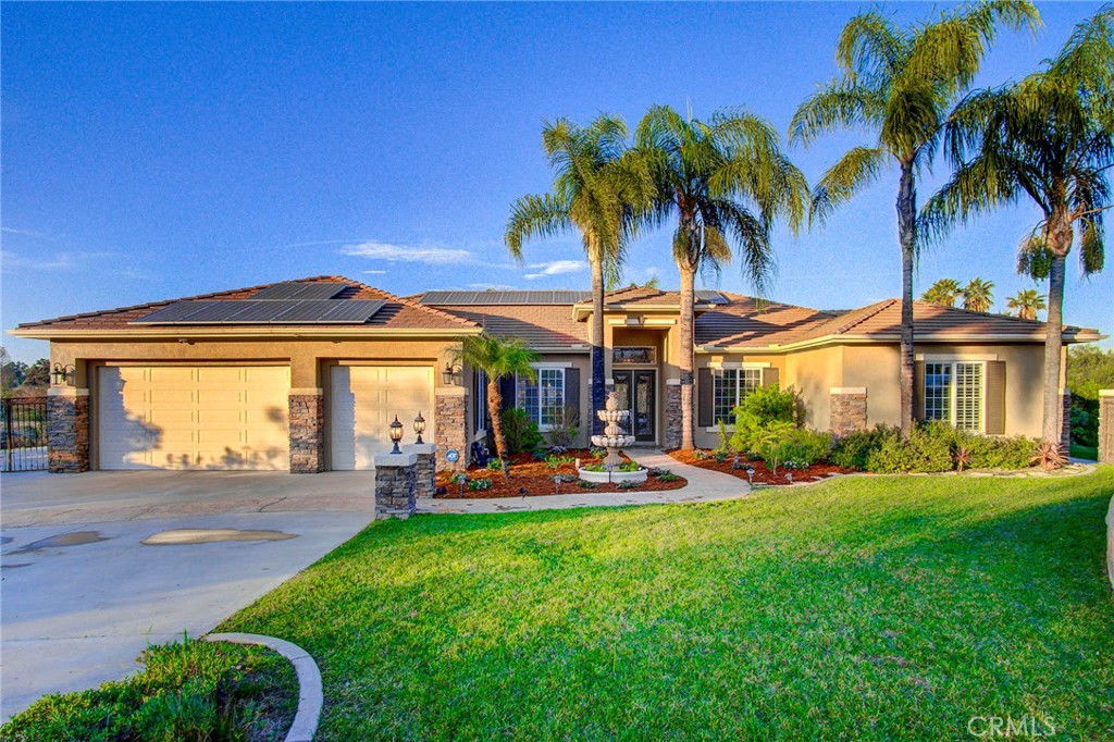18120 Gentian Avenue Riverside, CA 92508 - Photo 7 of 51 a view of a house with a swimming pool