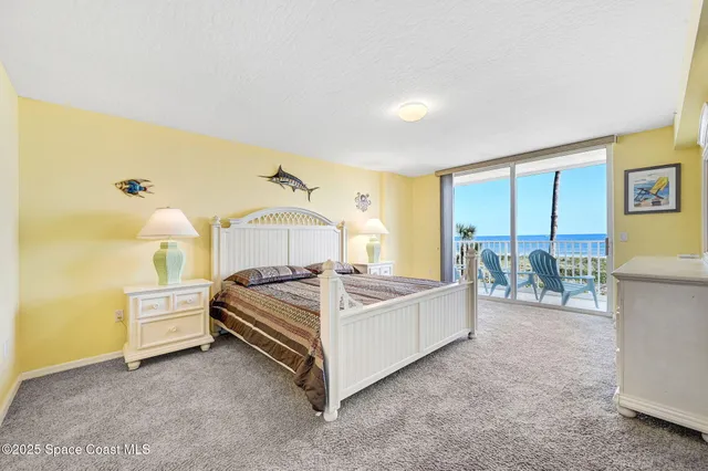 a bed room with a bed and a table