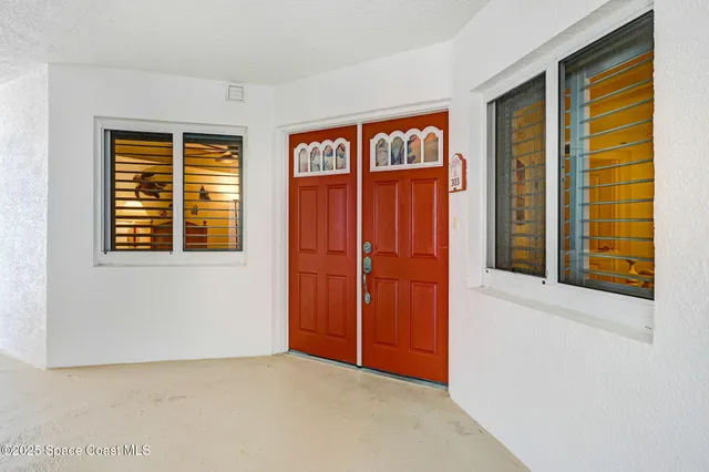 an empty room with windows