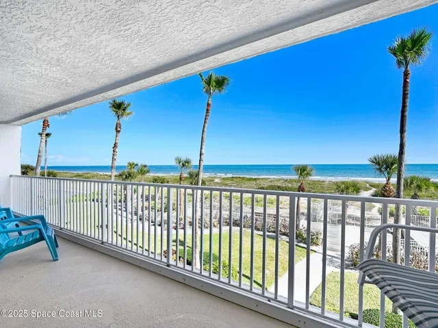 a view of balcony with furniture