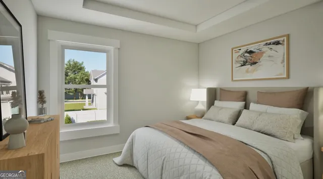 a bedroom with a bed and a painting on the wall