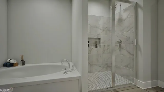 a living room with furniture kitchen and a chandelier