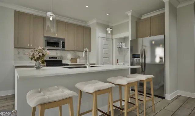 a kitchen with a table and chairs in it