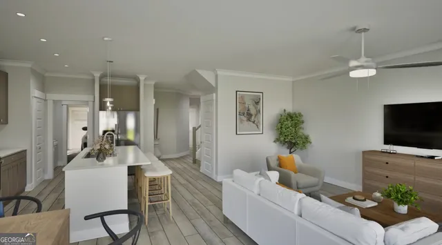 a living room with furniture and a flat screen tv