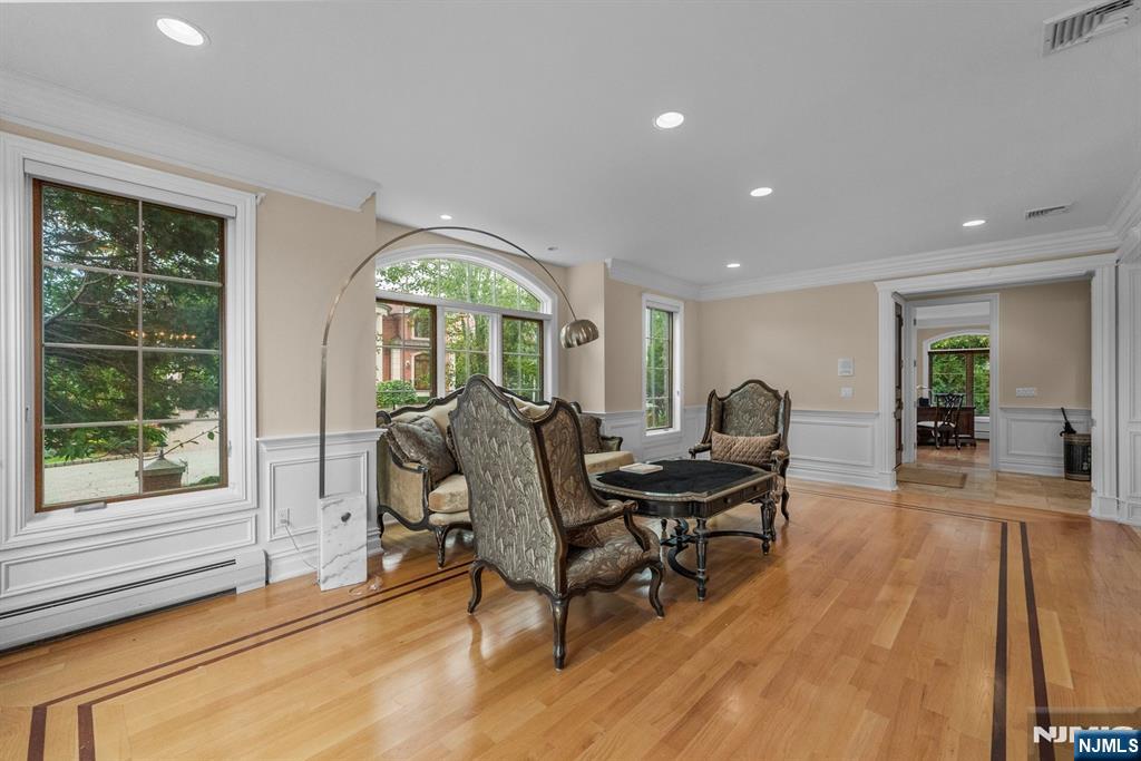 1 Euclid Road Fort Lee, NJ 07024 - Photo 19 of 50 a living room with furniture and a large window
