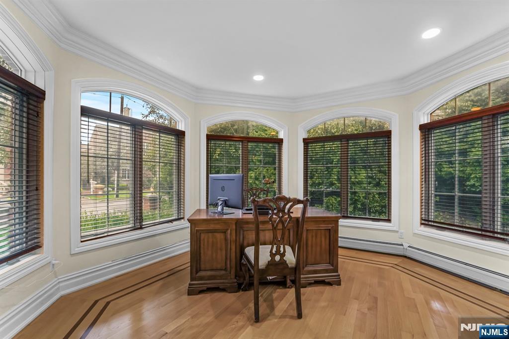 1 Euclid Road Fort Lee, NJ 07024 - Photo 20 of 50 a view of a dining room with furniture large windows and wooden floor