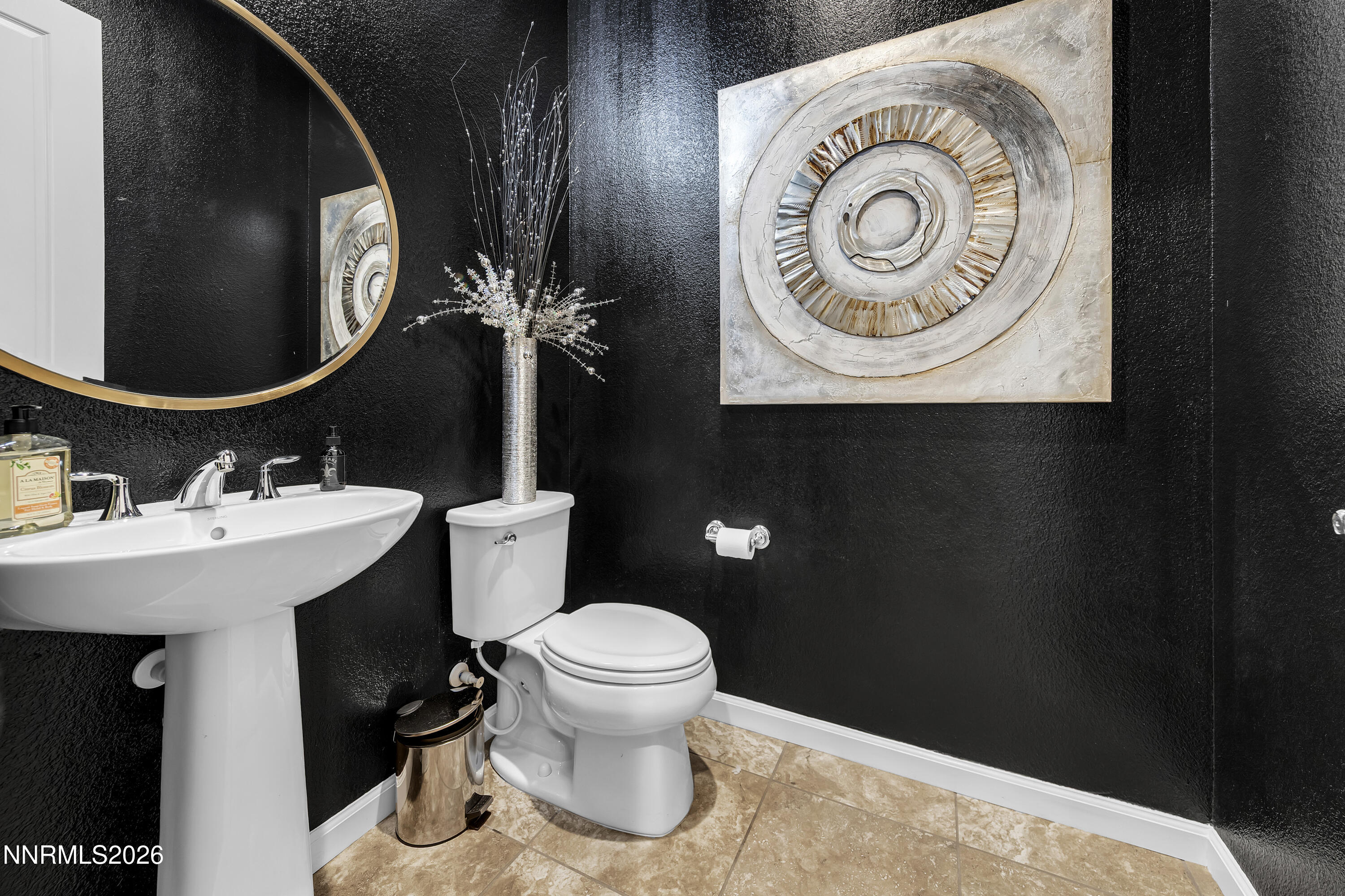 9021 Iron Sky Court Reno, NV 89523 - Photo 17 of 39 a bathroom with a toilet and a sink