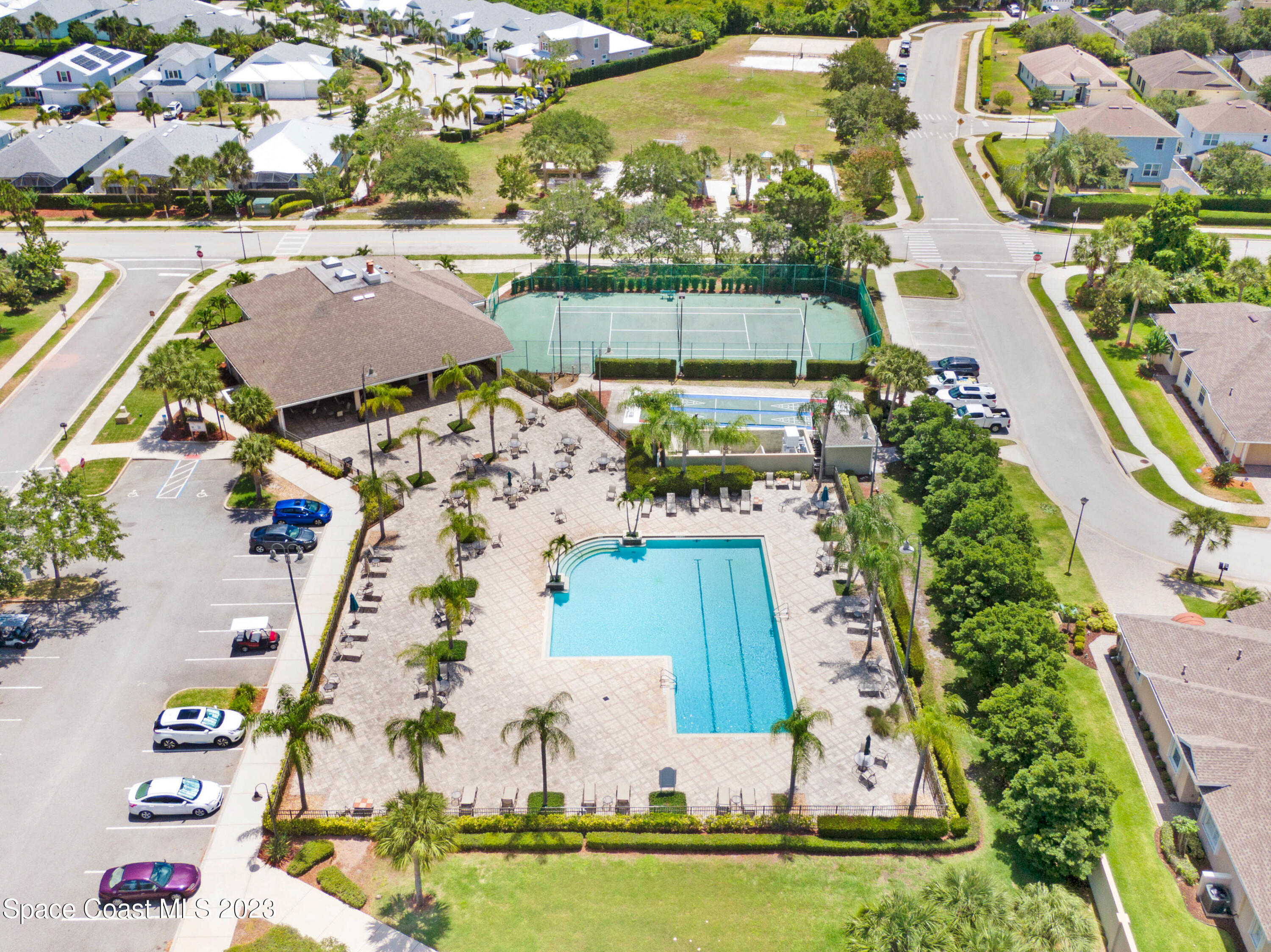 1202 Becket Place Melbourne, FL 32940 - Photo 20 of 69 an aerial view of house with yard swimming pool and outdoor seating