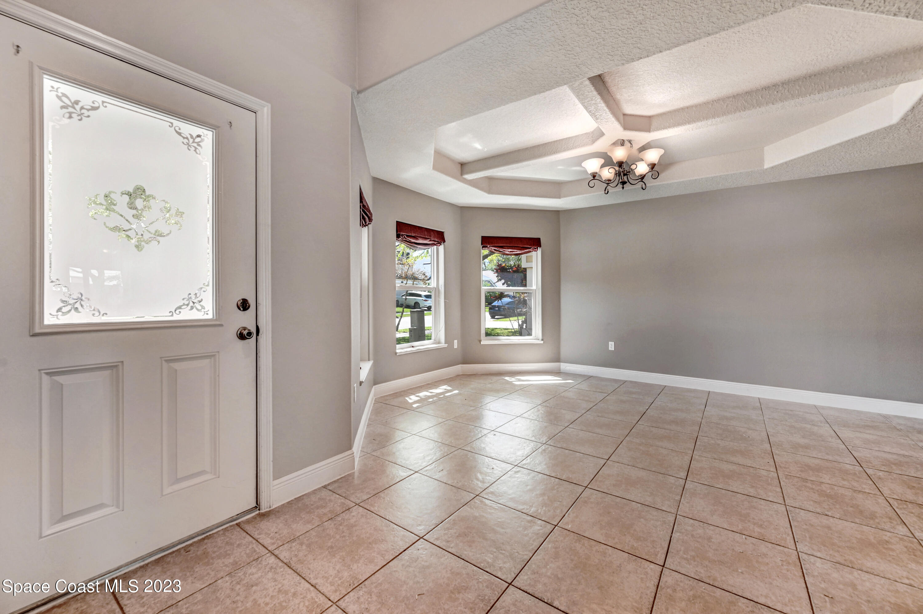 1202 Becket Place Melbourne, FL 32940 - Photo 48 of 69 wooden floor in an empty room with a window