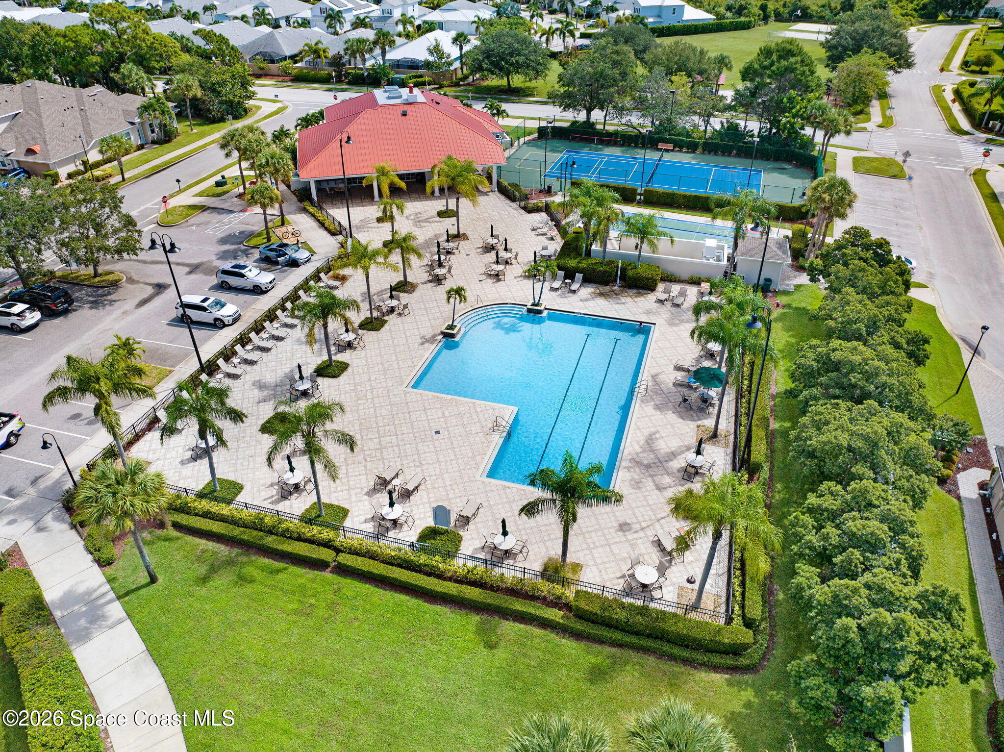 1202 Becket Place Melbourne, FL 32940 - Photo 69 of 69 an aerial view of a house with a garden and lake view